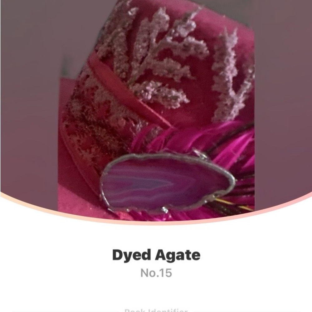 Hot pink large brim hat with agate crystal, and Peacock Feather.